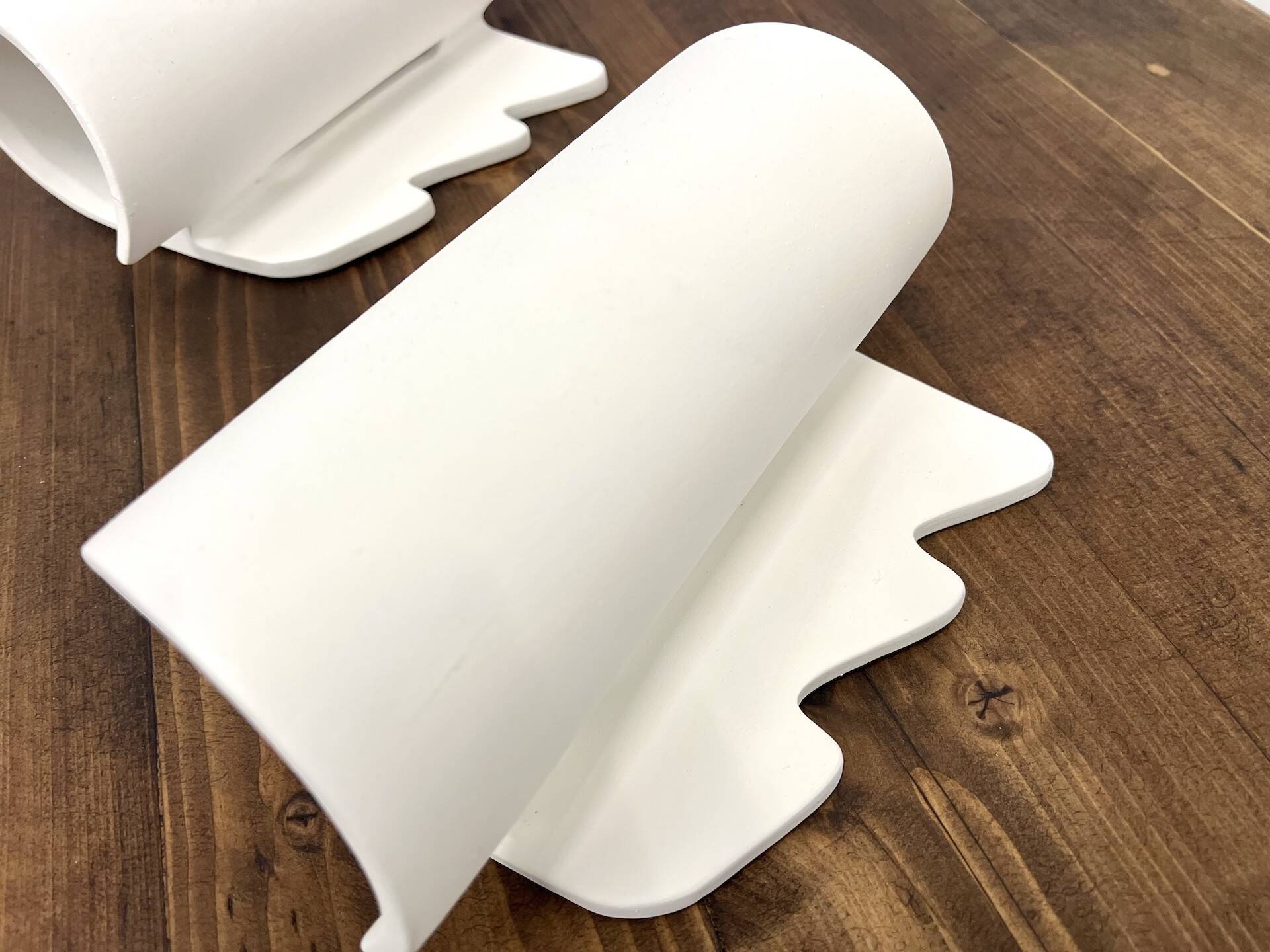 Pair of ceramic wall lights, circa 1990