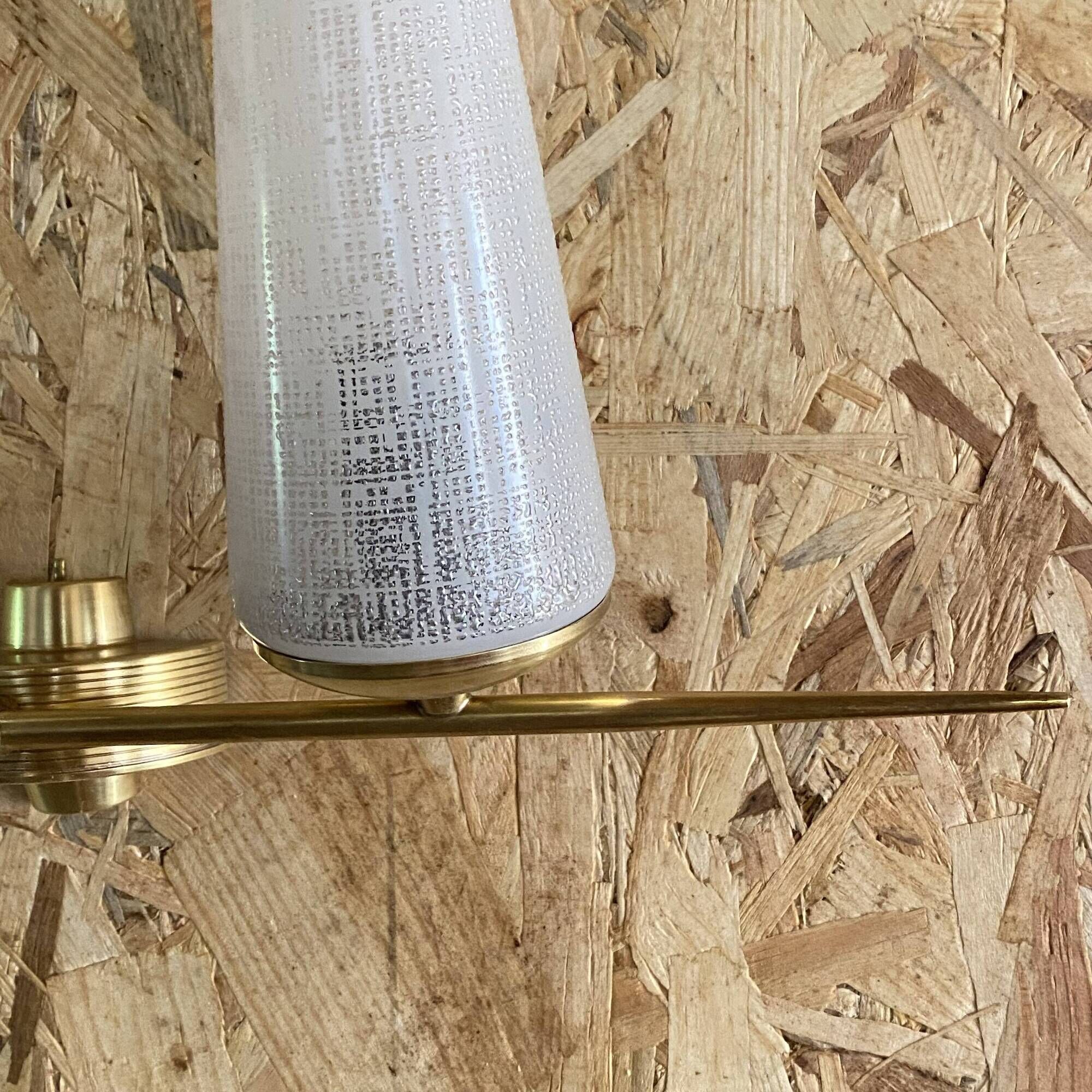 Pair of vintage double wall lights in brass with white ribbed glass tulips.