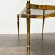 Mid-century German Hollywood neoclassical brass and glass side table from the 1950s.