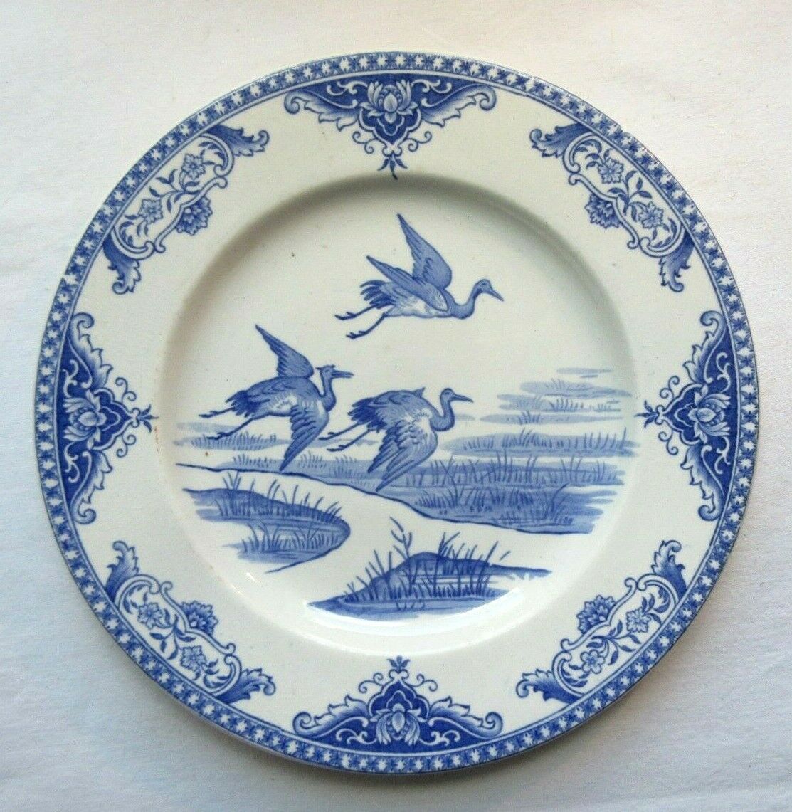 Gien art nouveau plate, blue décor, night animals