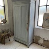 Blue patinated cap cabinet