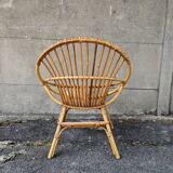 Fauteuil coquille en rotin vintage années  70 fabrication artisanale bohème