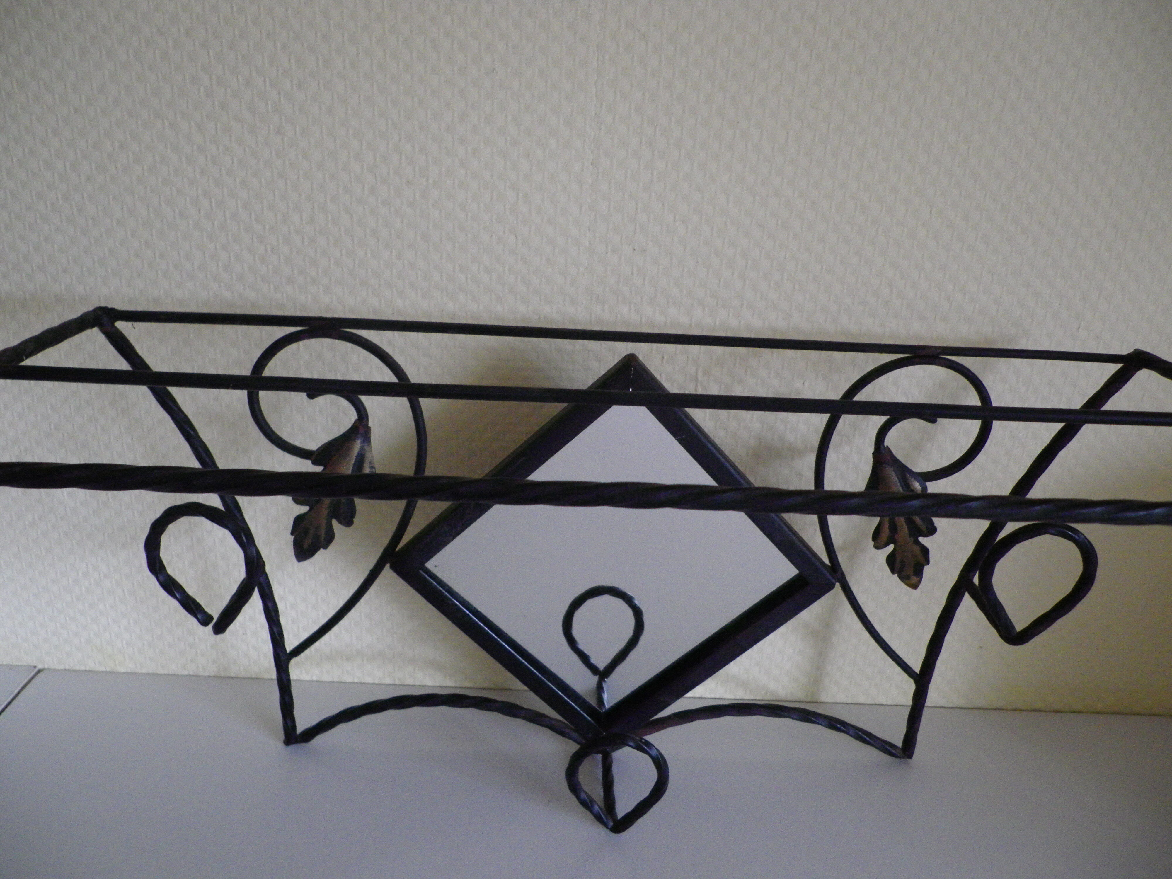 Wrought iron wall holder with top support and built-in mirror