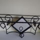Wrought iron wall holder with top support and built-in mirror