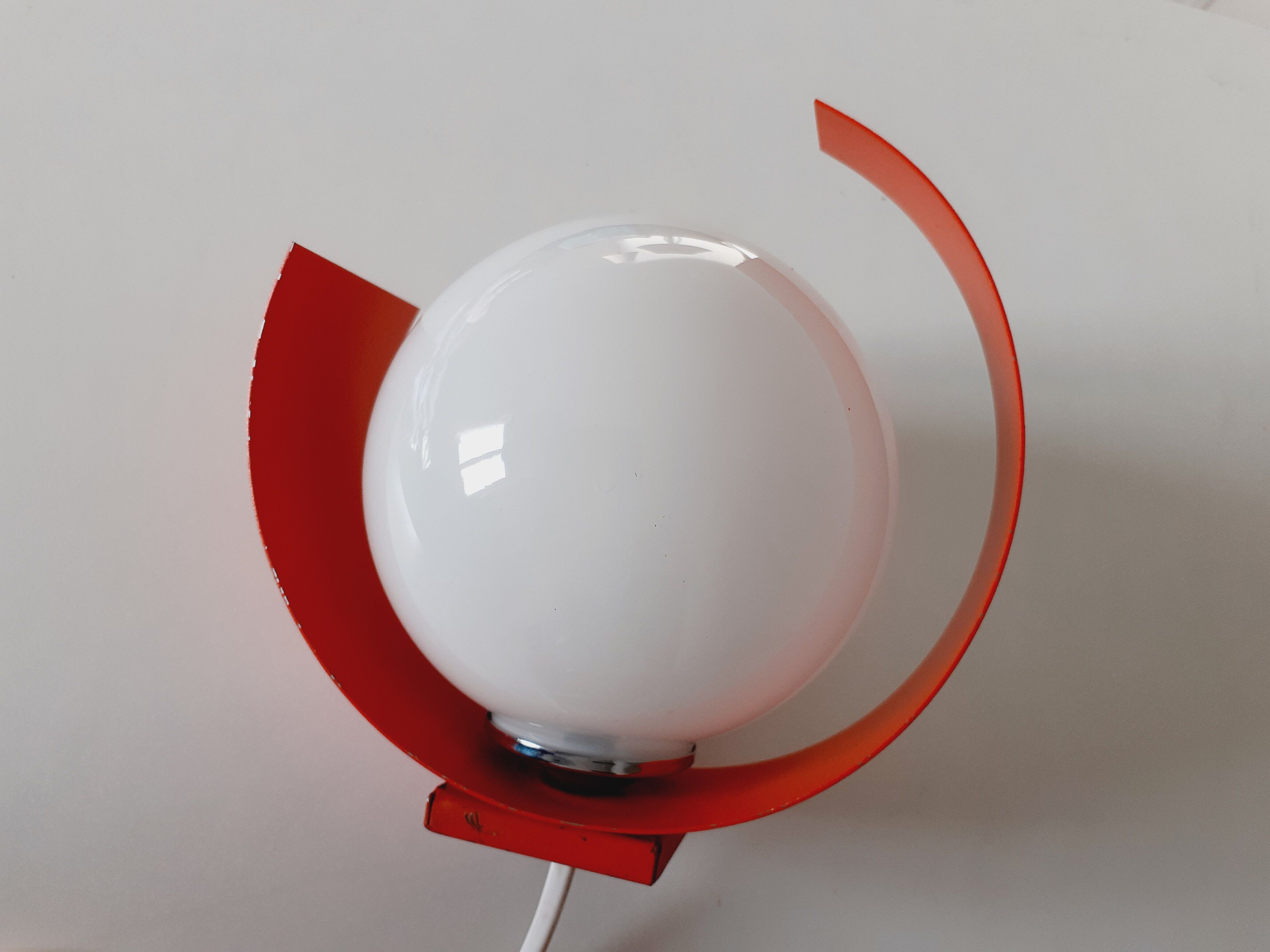 Pair of orange space age wall lamps
