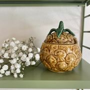 Set of ceramic fruits, a strawberry decanter and two lemon and pineapple jam jars