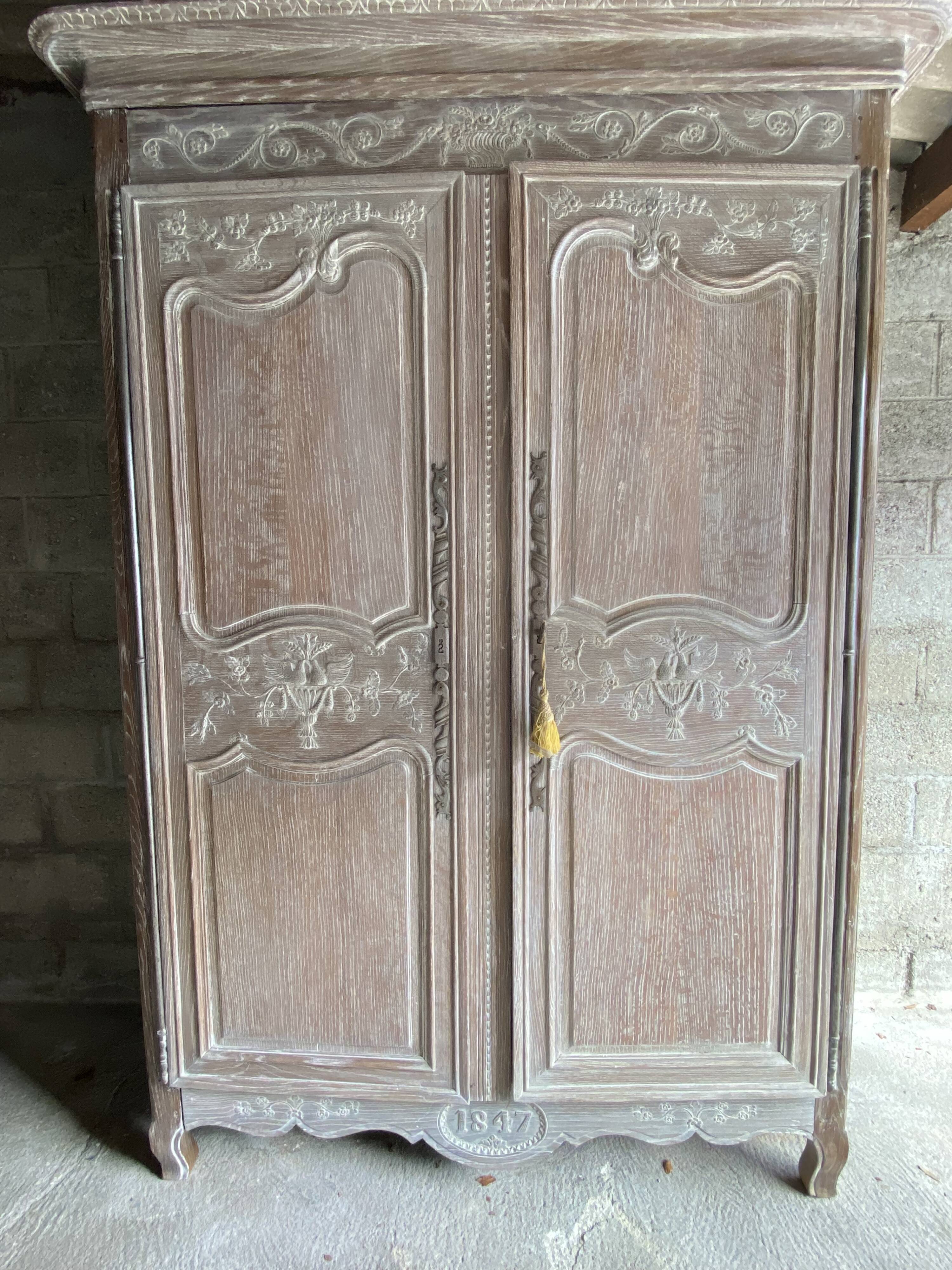 19th century limed oak wardrobe.