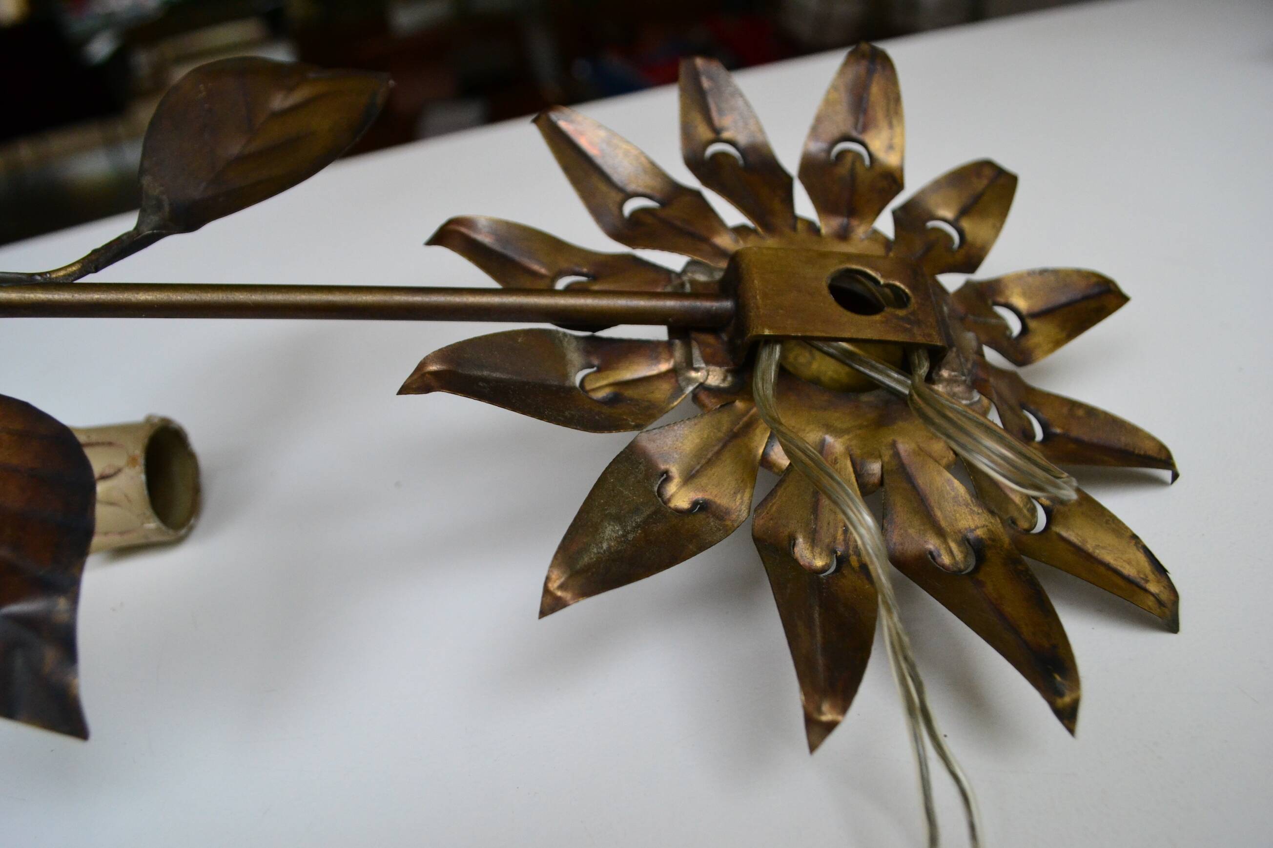 Brass flower wall light from the 1970s.
