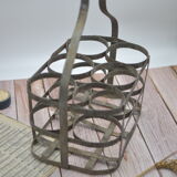 Old metal bottle holder