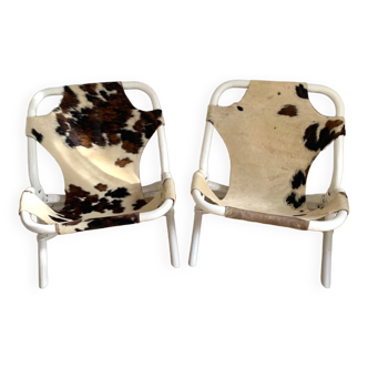 Bamboo and cowhide chairs from the 70s