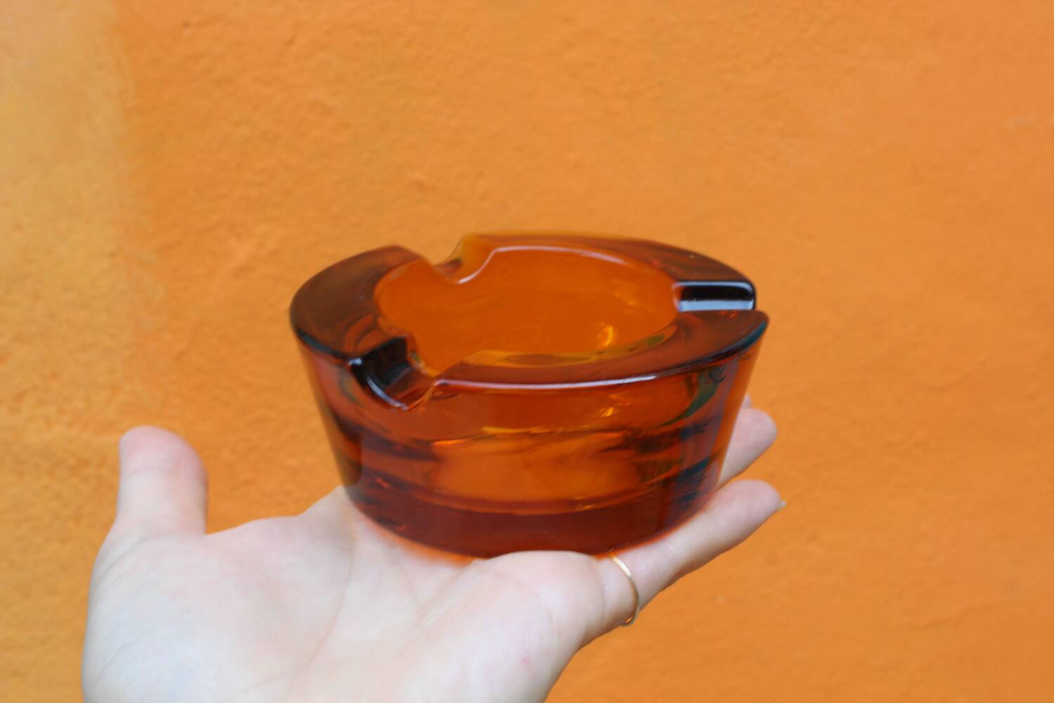 Amber glass ashtray