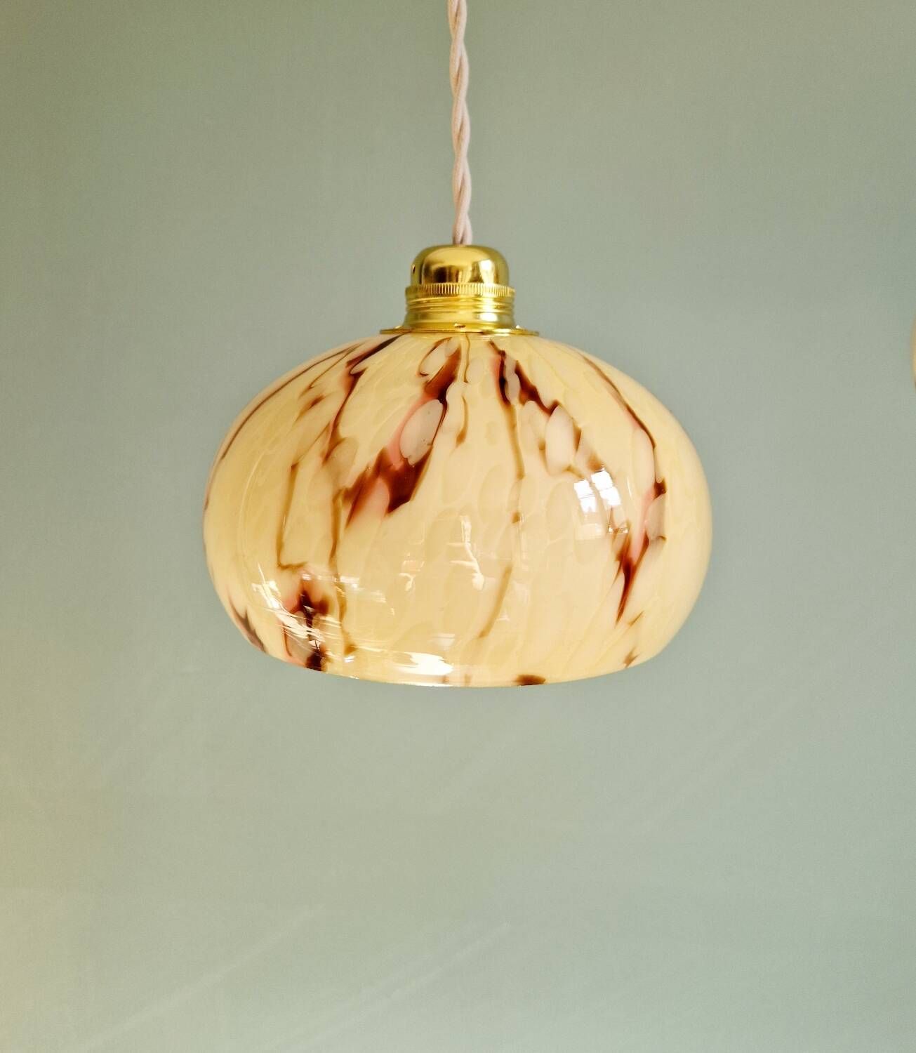 Trio of Art Deco pendant lights in marbled opaline glass, 1920s-30s
