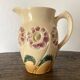 Flower-patterned earthenware pitcher