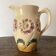 Flower-patterned earthenware pitcher