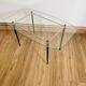 Coffee table from the 50s/60s, glass, brass, black metal.