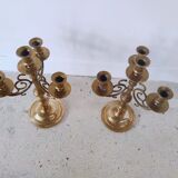 Pair of four-light candle holders in gilded brass