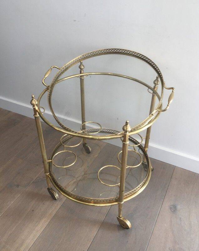 Round brass rolling table attributed to Maison Jansen