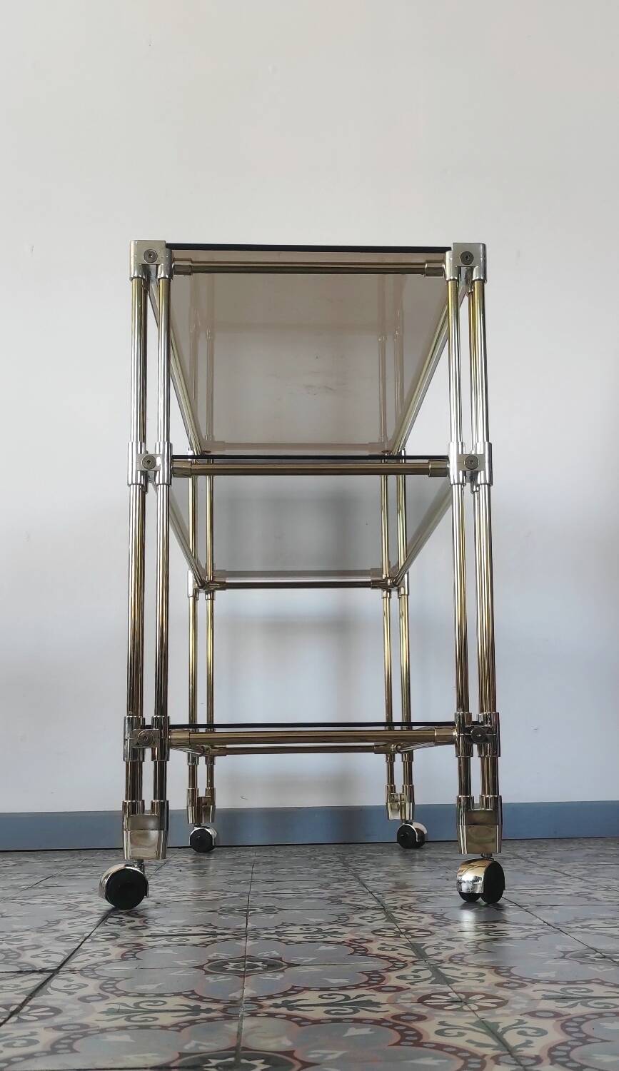 Dessert, vintage gold rolling bar, chrome and smoked glass.