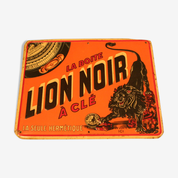 Plaque publicitaire de cirage: le lion noir