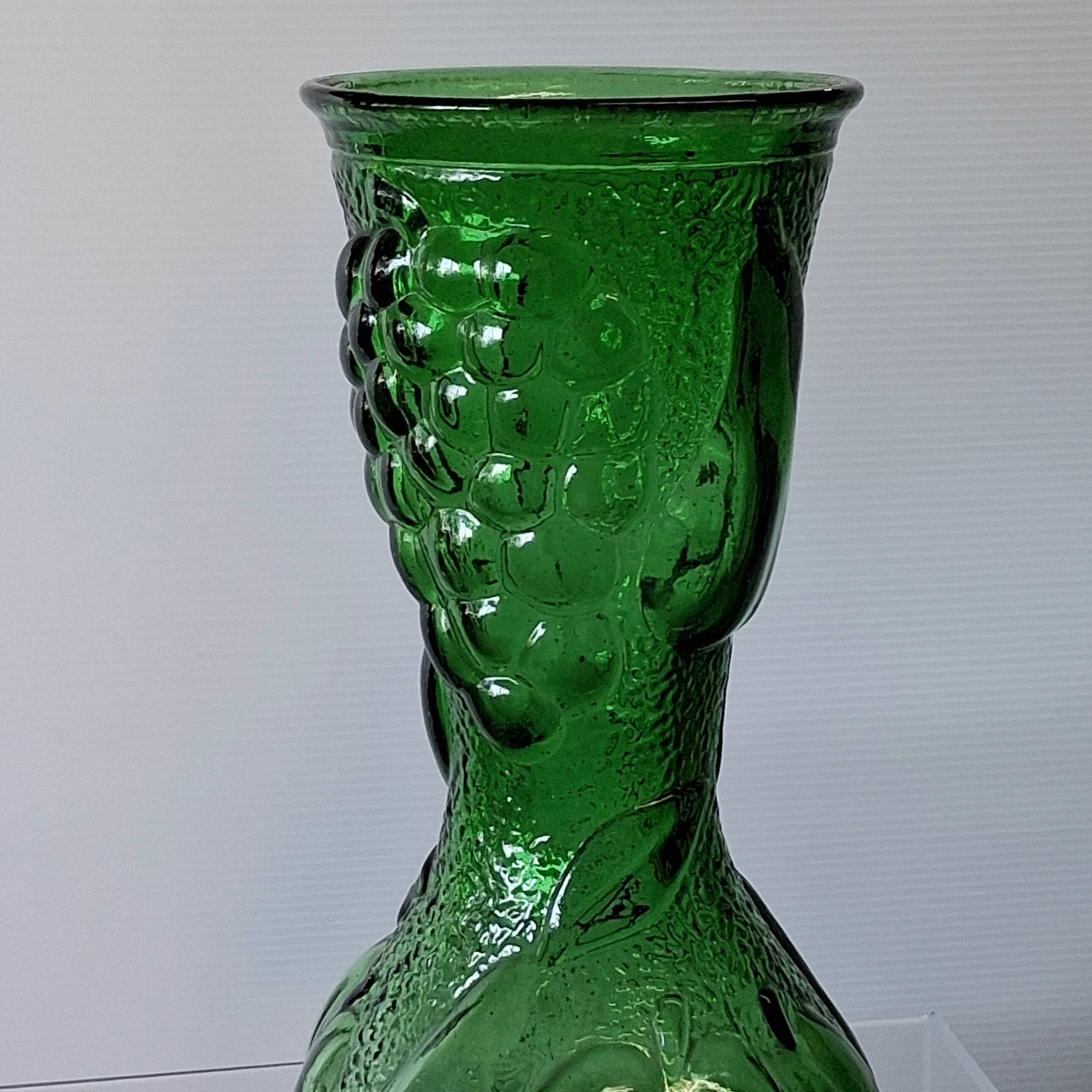 Vintage green glass vase with a fruit design in very good condition.