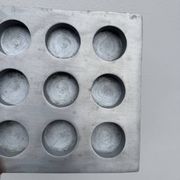 Brutalist style brushed aluminum candle holder