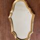 Miroir doré de style Louis XV sobre 32 X 22