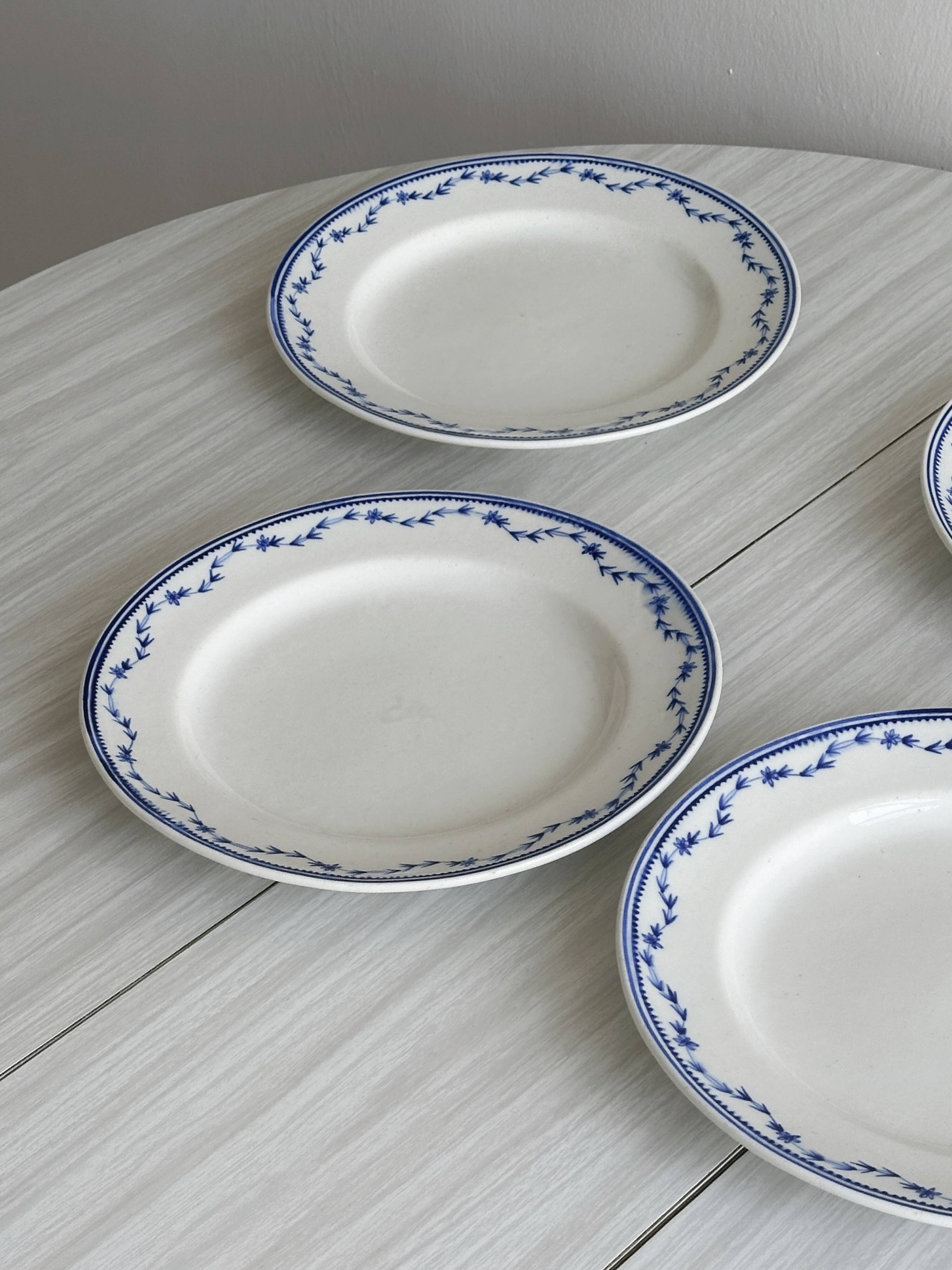 4 antique ceramic plates with blue flowers