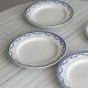 4 antique ceramic plates with blue flowers