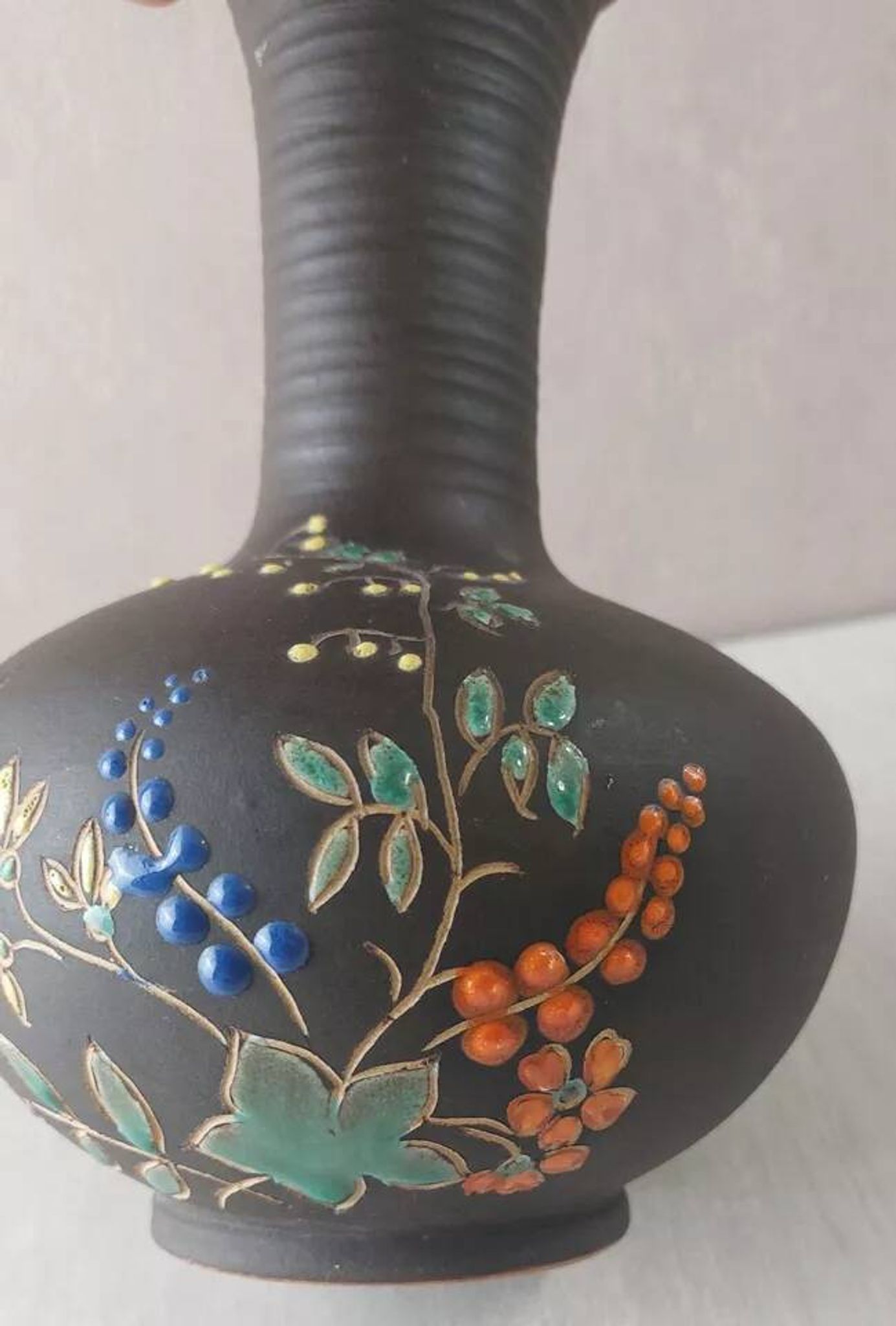 Old vase, enamelled flower decoration, to be identified