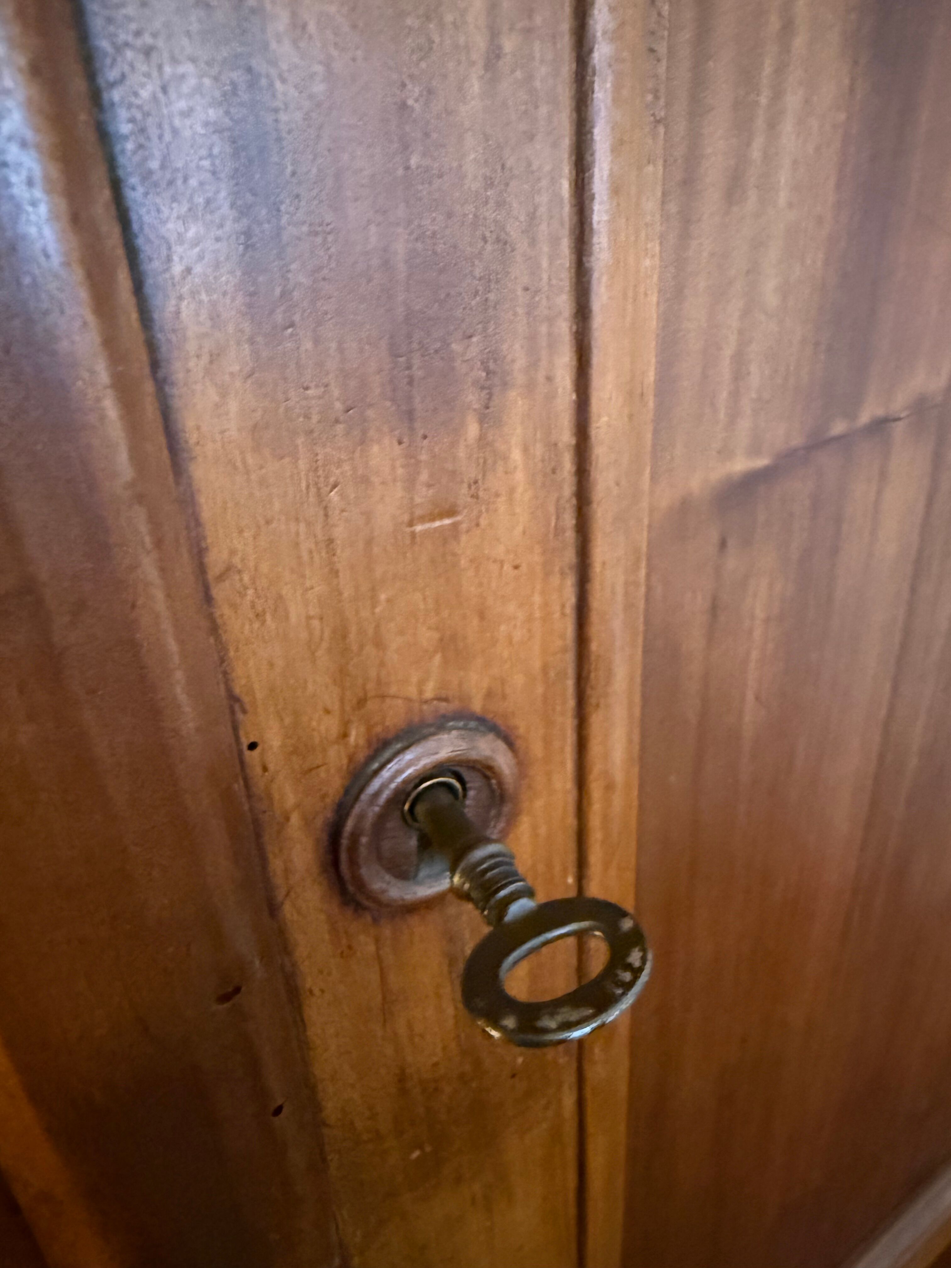 Antique solid wood wardrobe, rustic, with drawers and original key.