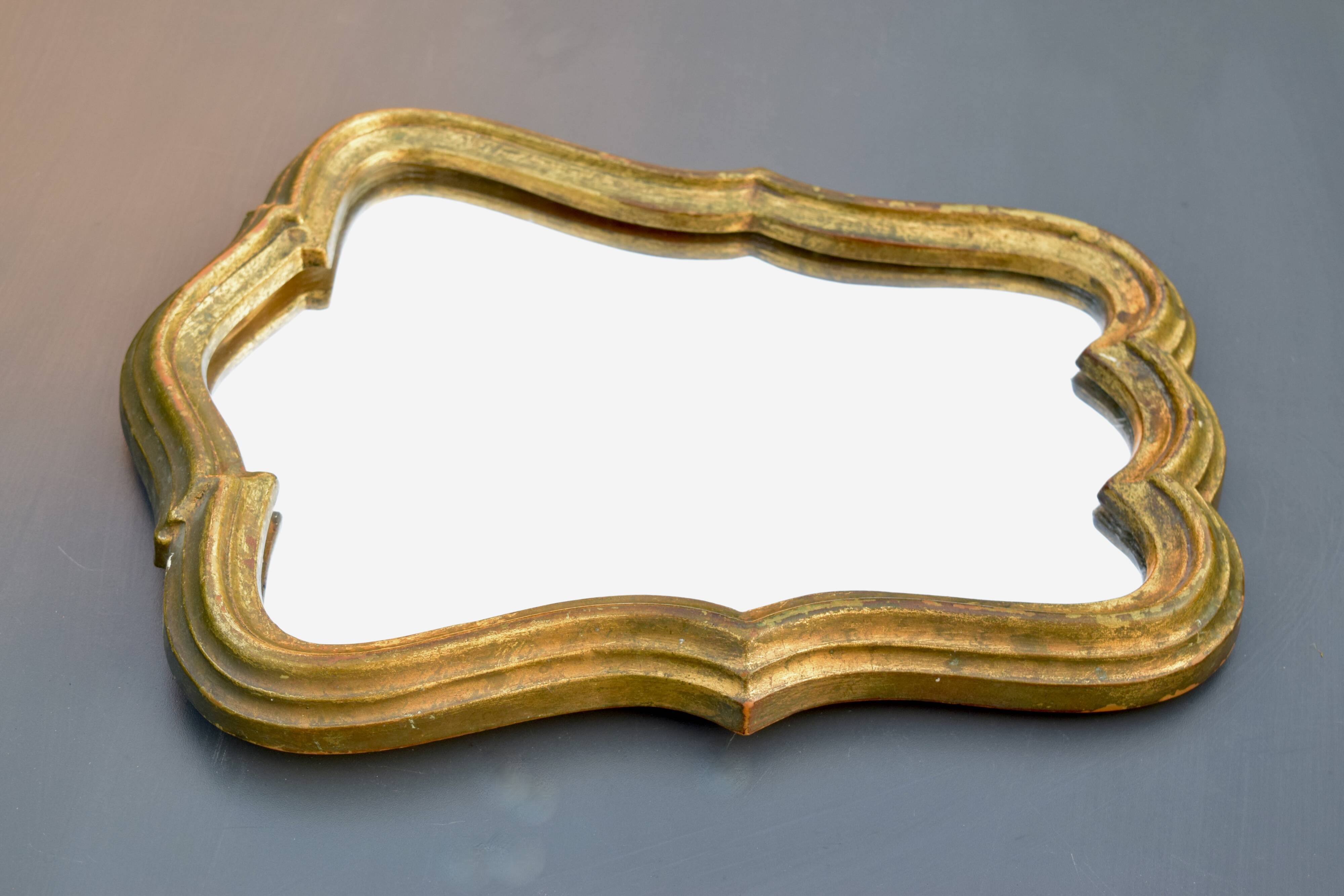 Mirror in gilded painted wood - 1960s