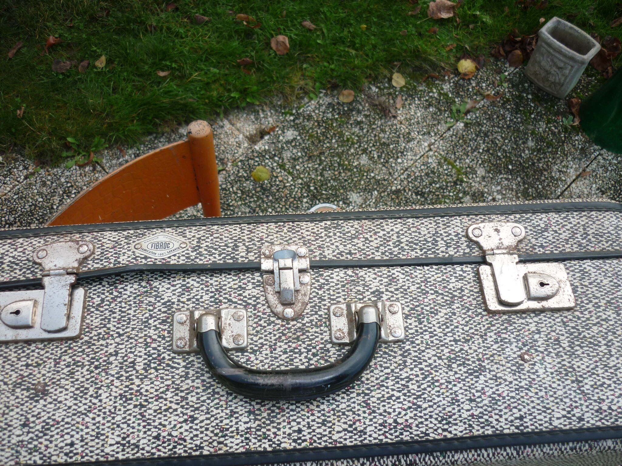 Antique black and white fibroc suitcase