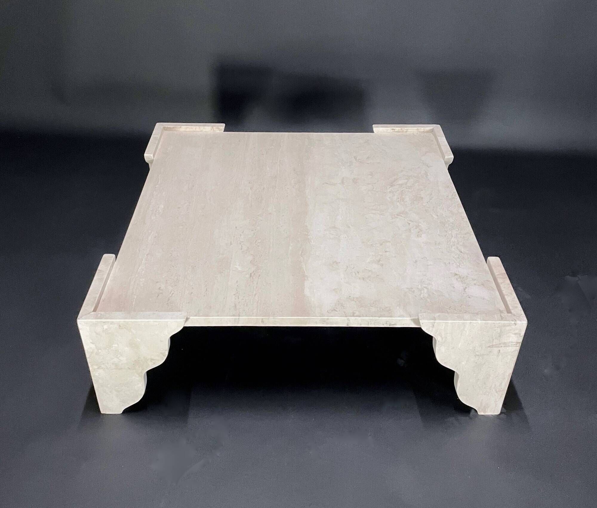 Large square coffee table in travertine by Claude Berraldacci. 1990s. France.