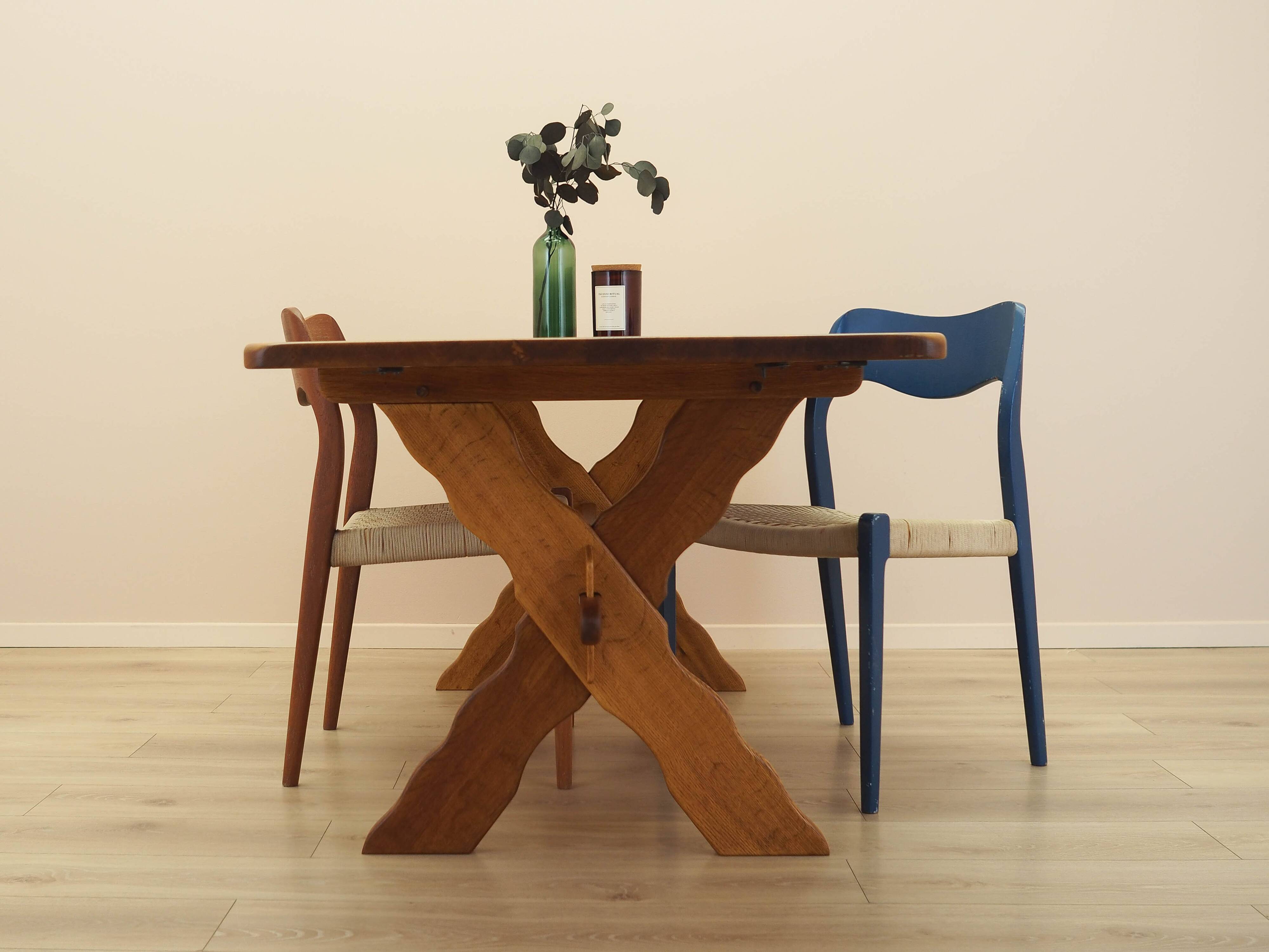 Solid oak dining table by Henning Kjærnulf, Denmark, 1960s