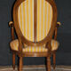 Fauteuil cabriolet médaillon de style Louis XVI