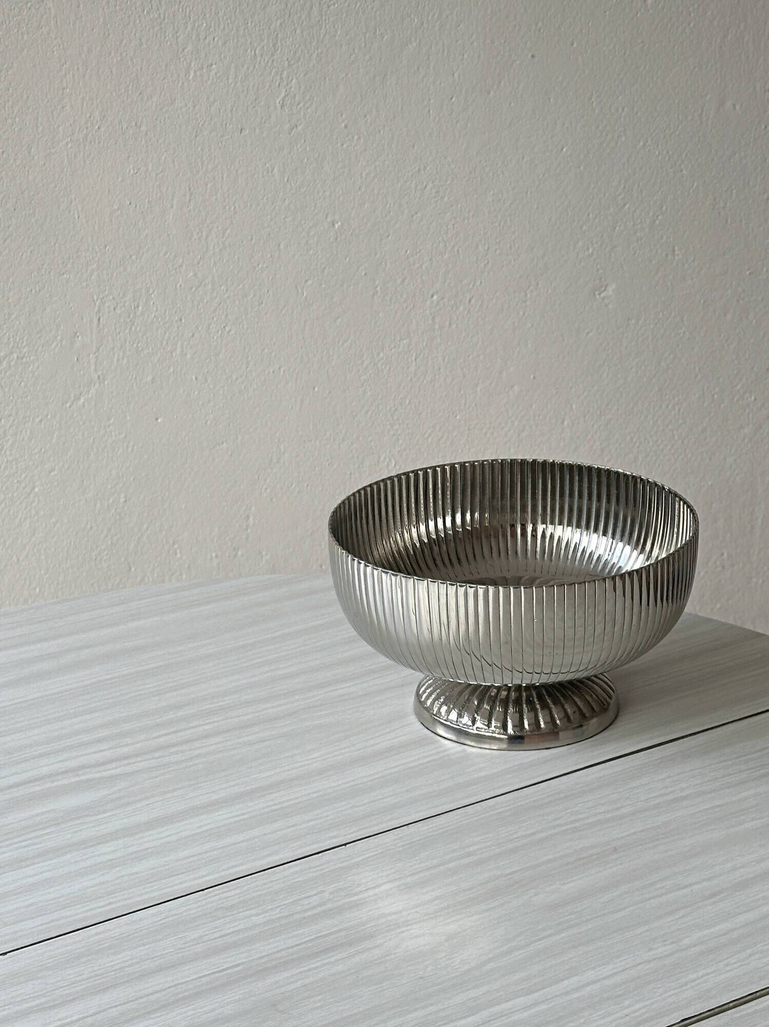 Silver stainless steel pedestal bowl