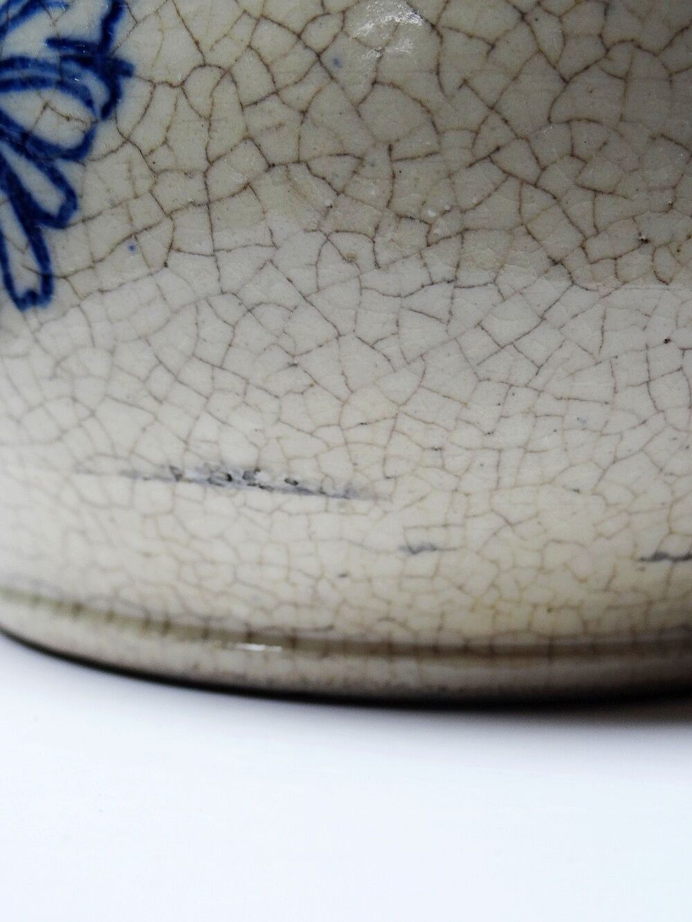 Fine earthenware pitcher with blue decoration, attributed to Saint-Uze, 19th century.