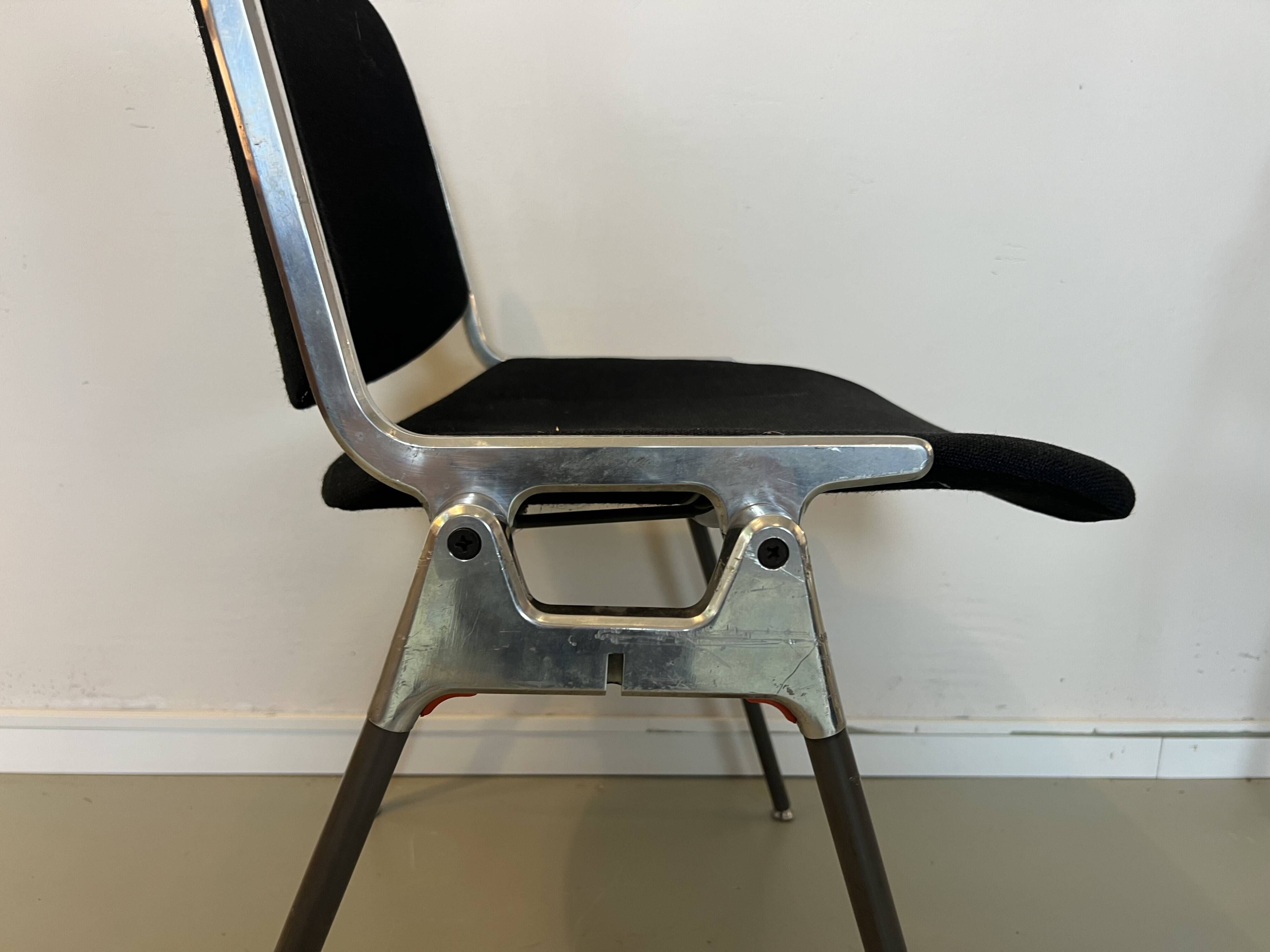 Black DSC chairs by Giancarlo Piretti for Castelli from the 60s/70s.
