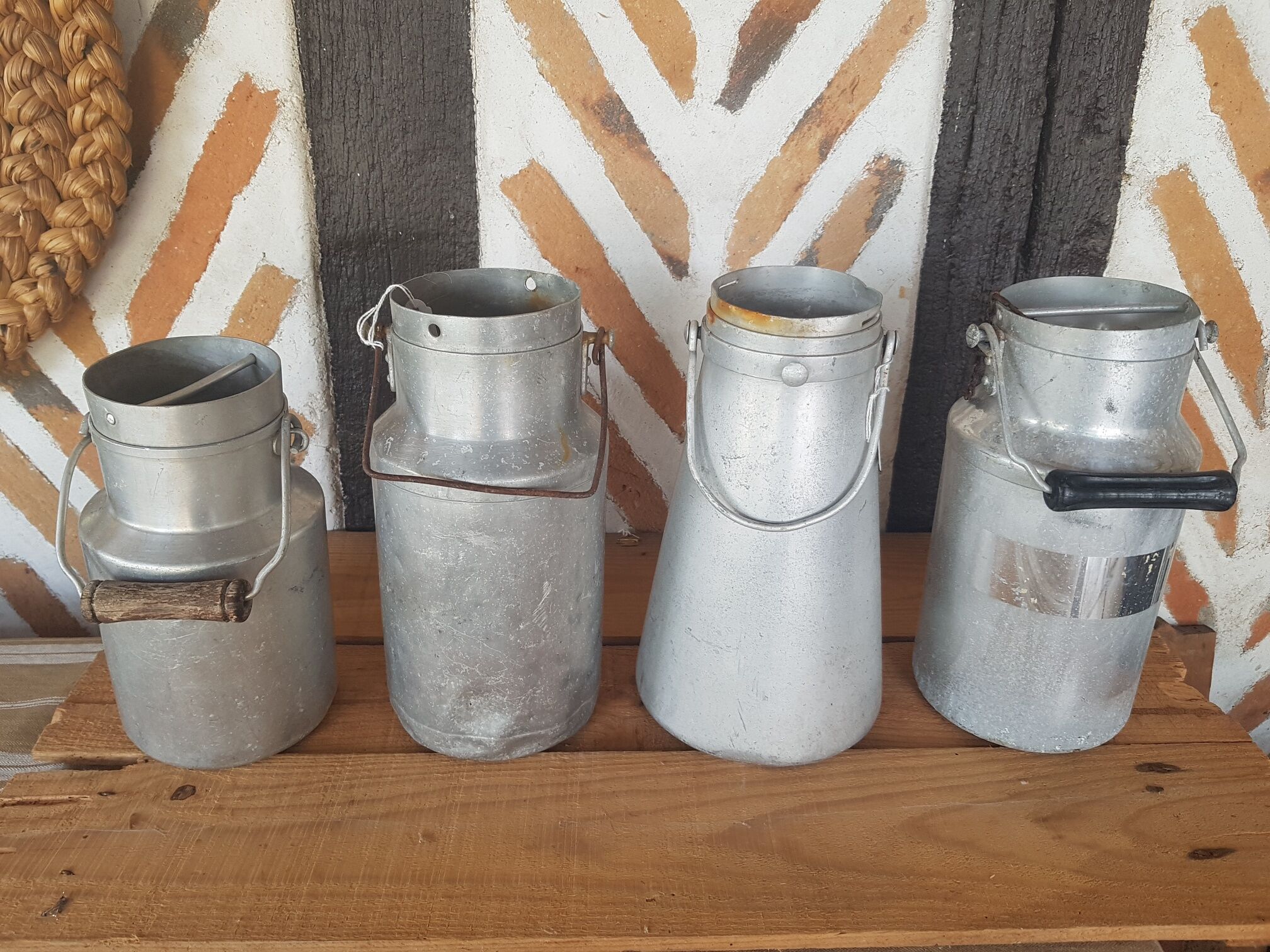 Set of 4 old metal milk canister jars