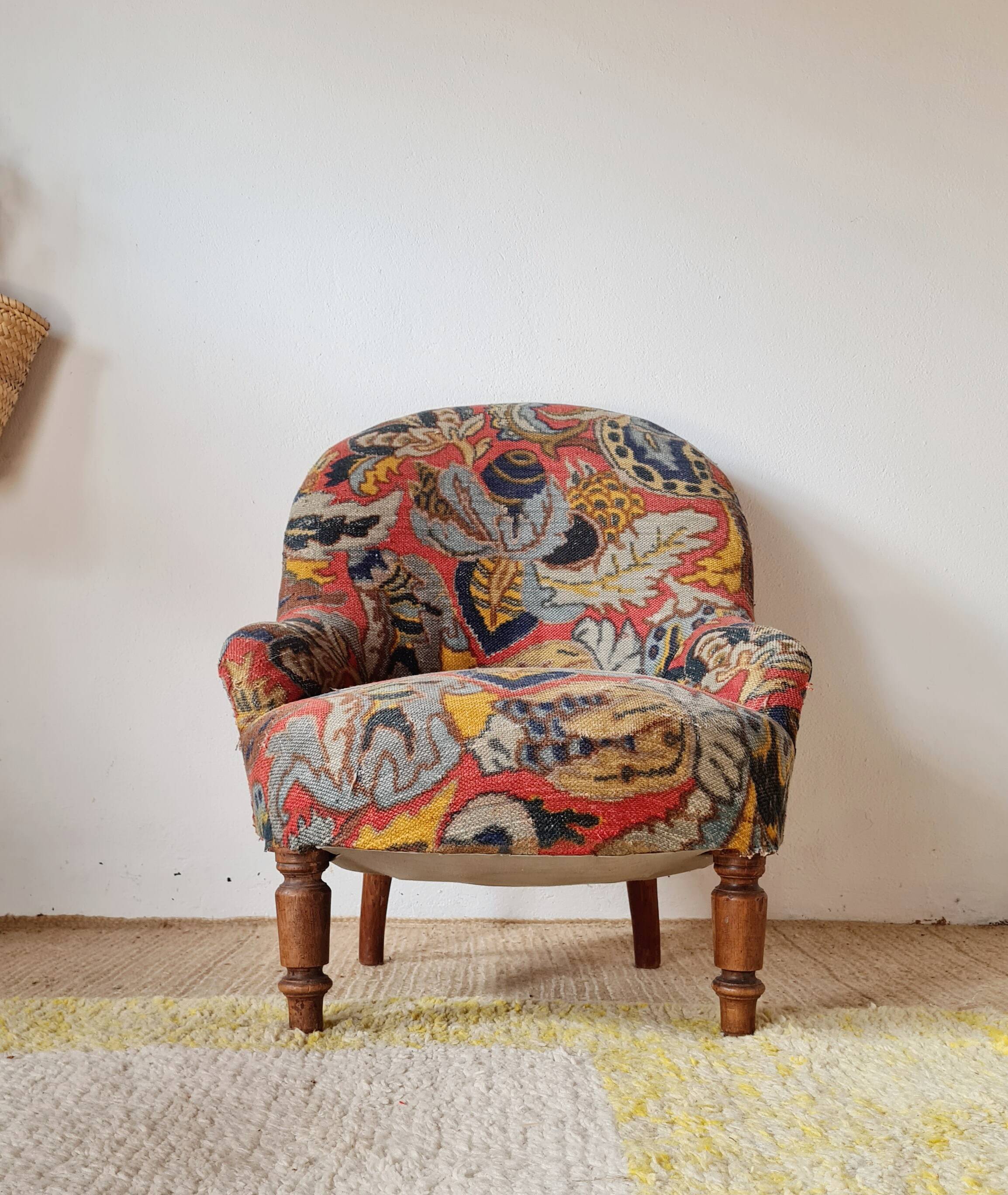 Small "madame" toad chair, vintage, upholstered in multicoloured floral fabric.