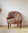 Small "madame" toad chair, vintage, upholstered in multicoloured floral fabric.