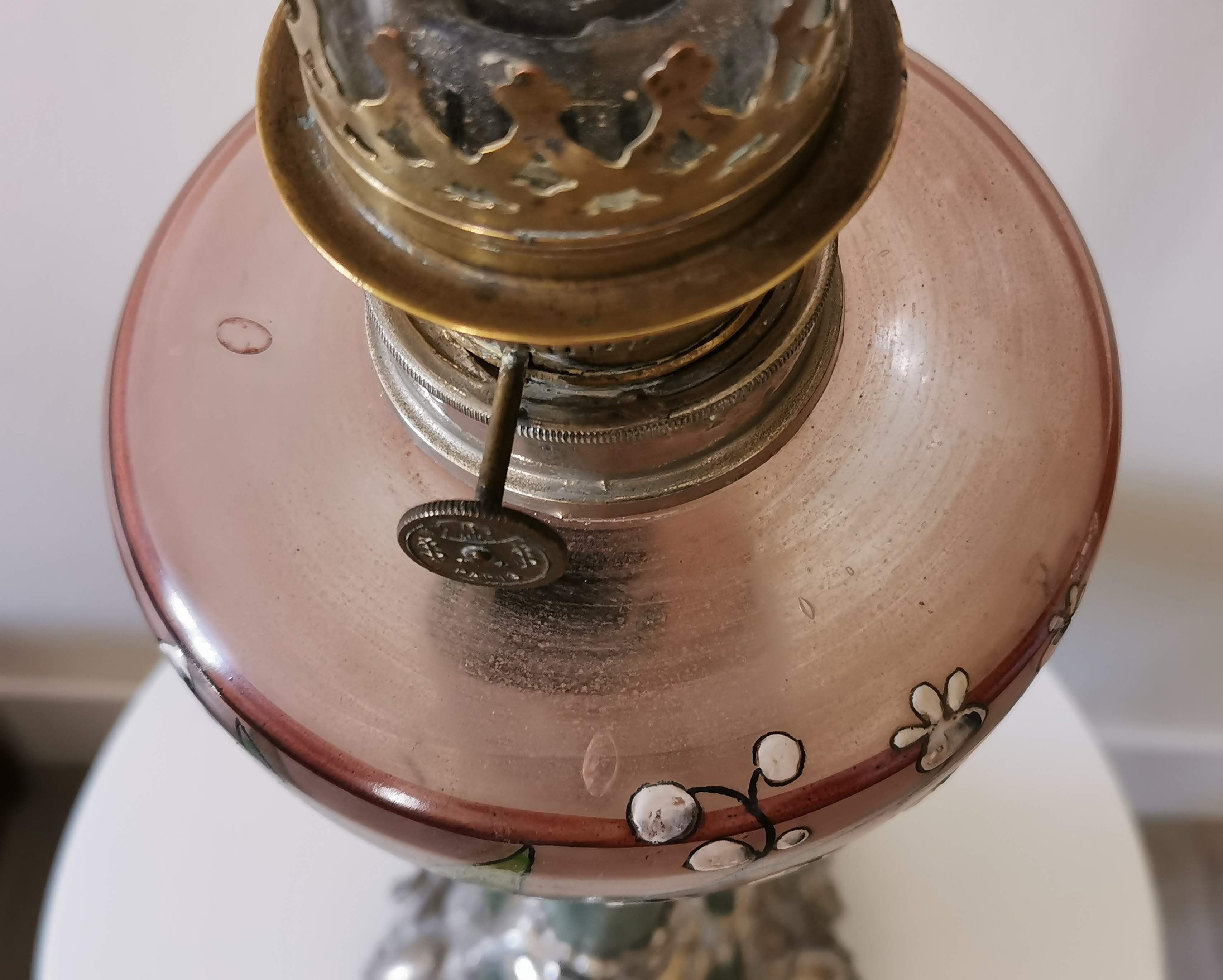 Kerosene lamp late nineteenth century mounted on Corinthian column.