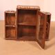 Old art deco showcase in burmese teak with original white edging