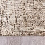 Tapis vintage à motifs floraux beige et marron
