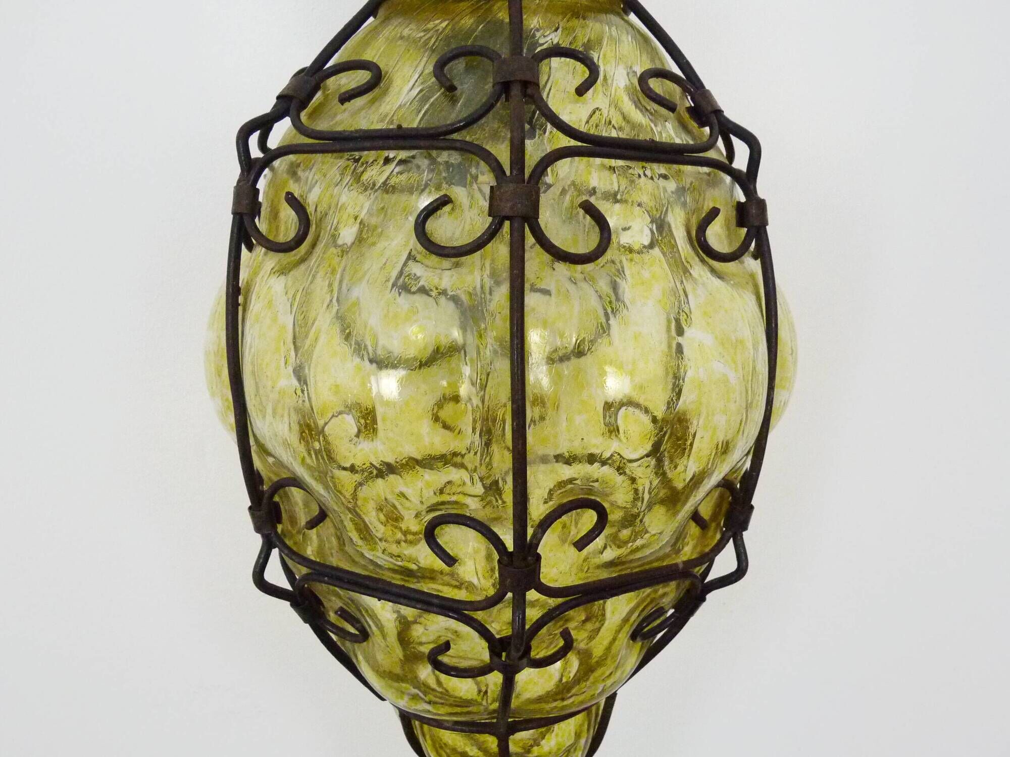 Vintage Italian wall light in transparent yellow blown glass and wrought iron. 70s 80s