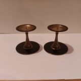 Pair of black brass candlesticks