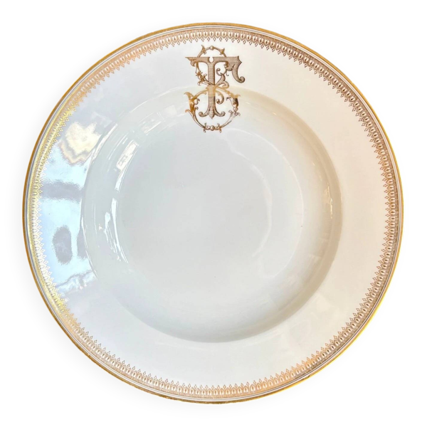 Assiette creuse en porcelaine dorée monogrammée ''F