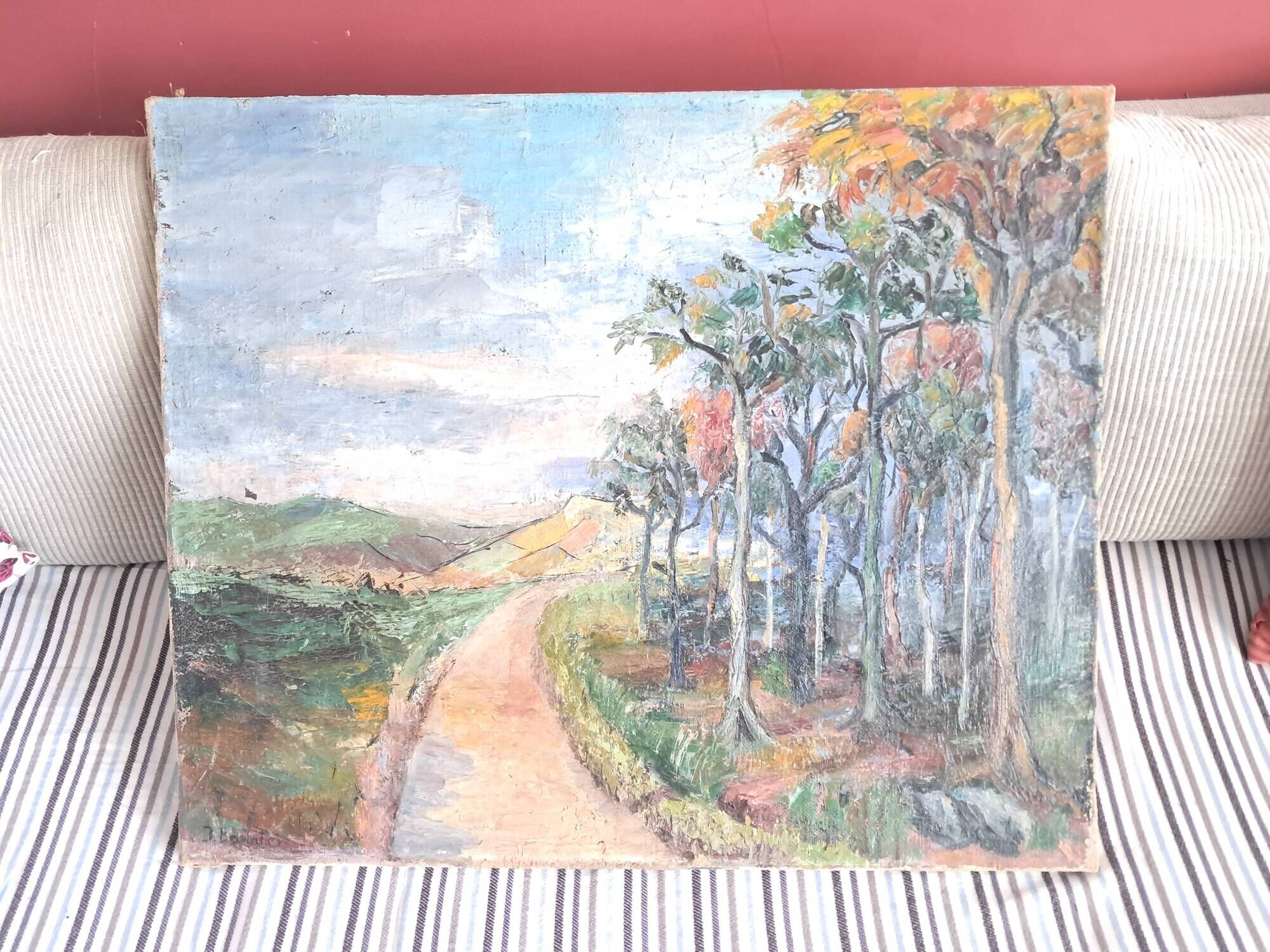 Large old oil painting depicting a landscape.