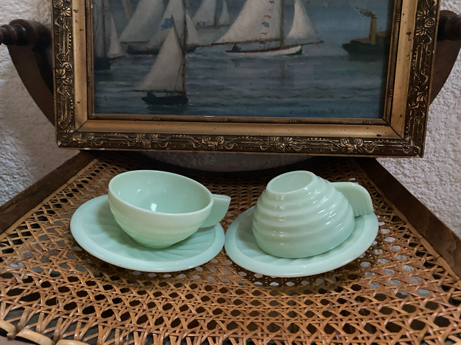 A pair of antique opaline tea cups.