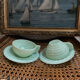 A pair of antique opaline tea cups.